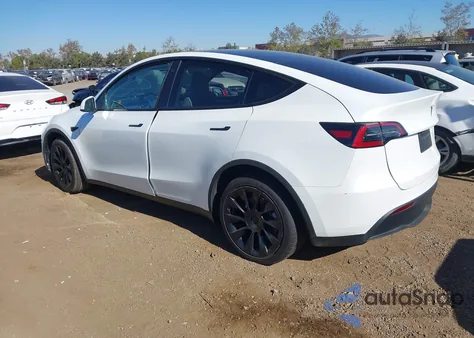 2022 Tesla Model Y из США, поврежденный, VIN 7SAYGDEE1NF554234